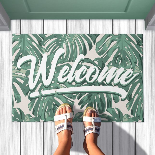 Tropical Leaves Welcome Script Green Doormat (Doormat in situ. Green leaves pattern, and script that says Welcome)