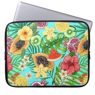 Tropical mix-fruit, flowers and leaves on blue laptop sleeve