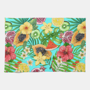 Tropical mix-fruit, flowers and leaves on blue tea towel