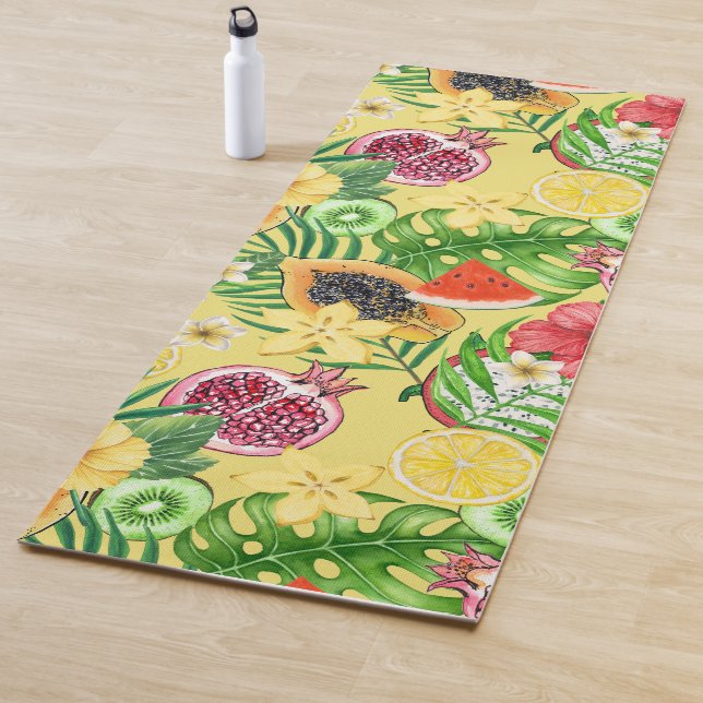 Tropical mix-fruit, flowers and leaves on yellow yoga mat (In Situ)