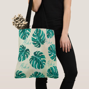 Tropical monstera emerald green palm leaves aloha tote bag