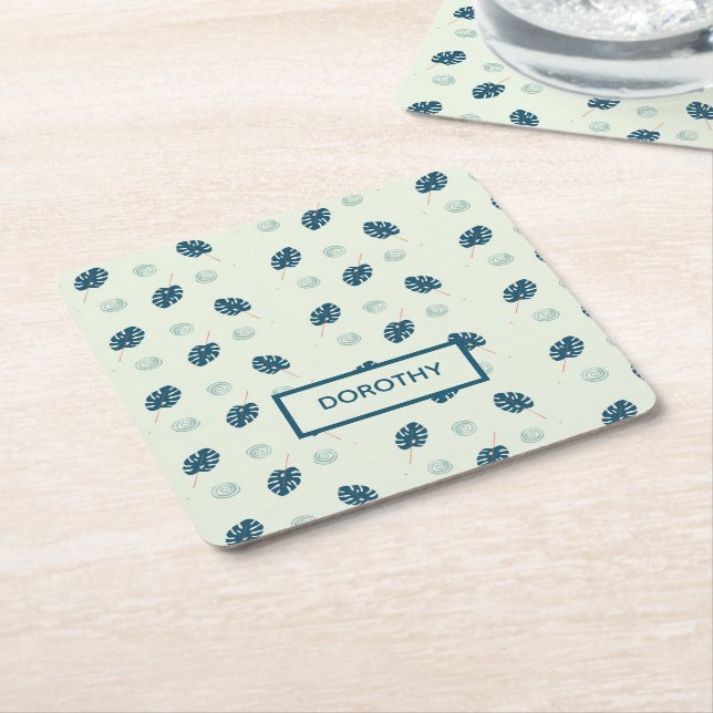 Tropical monstera leaves monogram on blue square paper coaster (Angled)