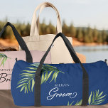 Tropical Palm Leaf Any Colour Handwritten Groom Duffle Bag<br><div class="desc">Wedding gift to personalise for the groom for his bachelor weekend or honeymoon. Groom is lettered in swirly handwritten calligraphy and, you can easily switch this to suit anyone in your wedding party, by entering the design tool. The design features a watercolor tropical palm leaf which is also used in...</div>