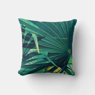 Tropical palm leaves cushion