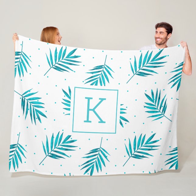 Tropical palm leaves pattern white and blue-green fleece blanket (In Situ)