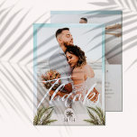 Tropical Palm Leaves Photo Palm Tree Monogram Thank You Card<br><div class="desc">Thank your wedding guests with our tropical watercolor palm leaves two-photo wedding thank you card. The design features a large photo on the front with "Thanks" displayed in a modern script. Modern arch palm tree monogram design to customise with couple's monogram. Our hand-painted watercolor leaves overlaid over the photo. The...</div>