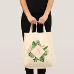 Tropical Palms Monogram Blush Pink Wedding Tote Bag<br><div class="desc">Destination Location - Tropical Palms Beach Botanical Blush Pink and Green Watercolor Spring Wedding Monogram Tote Bags on canvas background - includes beautiful and elegant script typography with modern botanical leaves and greenery for the special Gift for a Wedding, Bridal Shower (Bride or Bridesmaid), Baby Shower, Bachelorette Party, Sweet 16,...</div>