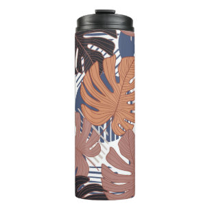 Tropical pattern with exotic monstera leaves seaml thermal tumbler