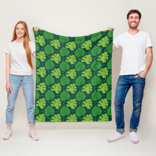 Tropical pattern with liana and monstera leaves fleece blanket