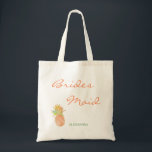 Tropical pineapple beach wedding peachy bridesmaid tote bag<br><div class="desc">Whimsical modern beach wedding bridesmaid tote bag with tropical peachy pink and faux gold glitter pineapple. Perfect choice for a modern beach,  sea,  oceanfront,  coastal,  tropical,  nautical or destination aloha themed wedding. Personalise it with your title and name!</div>
