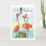 Tropical Pineapple Pink Flamingo Christmas Holiday Card<br><div class="desc">Beautiful pink flamingo Christmas cards that you can personalise for the holiday season! Friends and family will love these artistic, unique tropical Christmas cards... This original design by Raphaela Wilson, depicts 2 pink flamingos wearing a festive Santa hat and reindeer antlers with a bag of golden pineapples against a watercolor...</div>