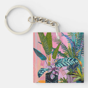 Tropical pink flamingos set against lush green key ring