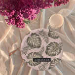 Tropical Pink & Gold Palm Leaves Pattern & Name Paper Plate<br><div class="desc">The Tropical Pink & Gold Palm Leaves pattern features a vibrant and exotic design inspired by tropical aesthetics. The colour scheme revolves around shades of pink and gold, creating a luxurious and stylish look. The pattern consists of palm leaves rendered in a variety of sizes and orientations, evoking a sense...</div>