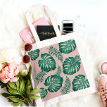 Tropical Pink & Green Palm Leaves Seamless Pattern Tote Bag<br><div class="desc">The Tropical Pink & Green Palm Leaves Seamless Pattern is a vibrant and lively design featuring an assortment of pink and green palm leaves arranged in a repeating pattern. The pattern has a seamless layout, meaning that the edges of the design blend together seamlessly to create a continuous and uninterrupted...</div>