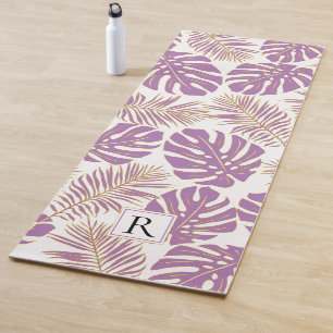 Tropical purple and gold leaves and monogram yoga mat