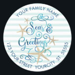 Tropical "SEAsons Greetings" Aqua Stripe Address Classic Round Sticker<br><div class="desc">A tropical twist on "Season's Greetings" with the words "Seas AND Greetings" featuring a tropical or beach look and feel to your Christmas holiday mail. The modern, elegant scroll script typography in a gorgeous turquoise ocean watercolor really pops against a light teal striped background and surrounded by starfish. Add your...</div>