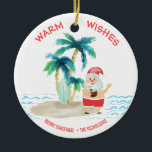 Tropical Surfing Santa Beach Warm Wishes Christmas Ceramic Ornament<br><div class="desc">Santa is taking a much needed vacation and is living the good life, surfing and relaxing on a tropical island beach. He's got his toes in the sand, a drink in his hand, palm trees and a warm ocean breeze. "Warm Wishes" greeting is in a pretty coral colour across the...</div>