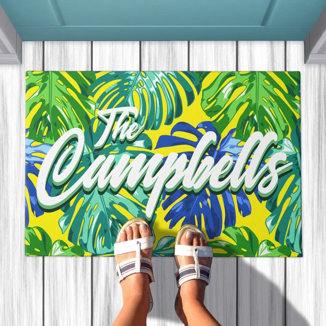 Tropical Surname Green Blue Yellow Monstera Leaves Doormat (Tropical leaves doormat in yellow & green, edit script to say your family name)