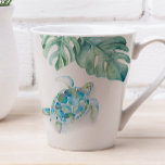 Tropical Turquoise Blue Watercolor Sea Turtle Mug<br><div class="desc">Add tropical island style to your home with my witty latte mug featuring my original hand painted watercolor sea turtle and monstera palm leaves in shades of blue, green and white. The words Seas The Moment are set in hand lettered script typography in navy blue. Personalise the words to Seas...</div>