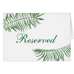 Tropical wedding reserved sign. Green leaves table