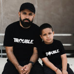 Trouble Double Funny Dad Son Daughter Matching T-Shirt<br><div class="desc">Get ready for double the fun with our "Trouble" and "Double" matching tees! Whether you're causing trouble with your son or just hanging out,  these matching tees are sure to turn heads. Perfect for Father's Day or any occasion,  let's get into double trouble!</div>