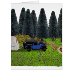 Truck with a Pull Camper in the Woods Cleared Camp