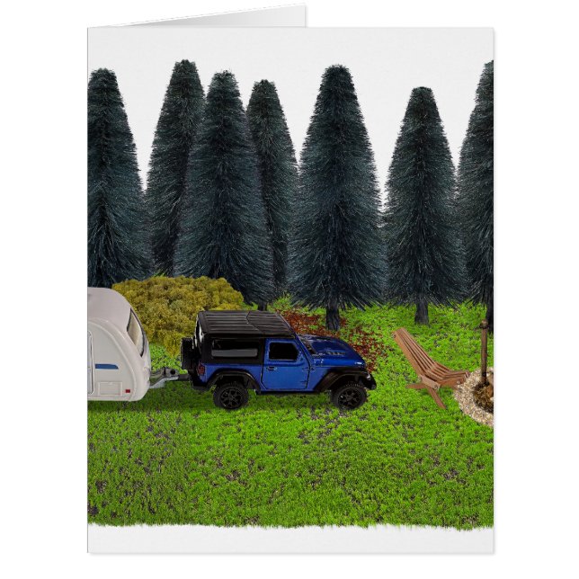 Truck with a Pull Camper in the Woods Cleared Camp (Front)