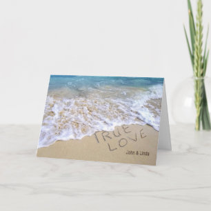 true love text in ocean sand card