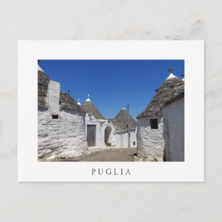 Trulli houses in Puglia white postcard