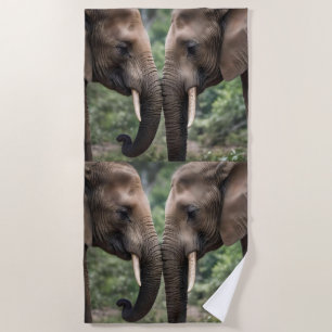 "Trunk to Trunk: A Gentle Elephant Embrace" Beach Towel