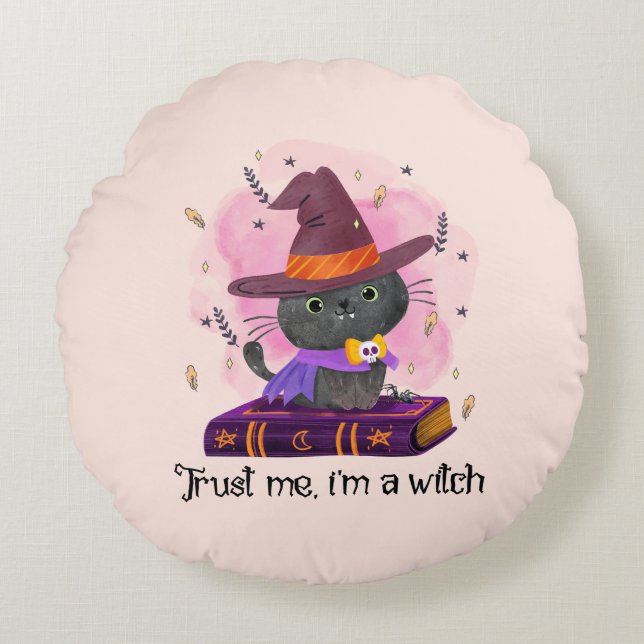 Trust Me I'm A Witch – Witch Cat on Magic Book Round Cushion (Front)