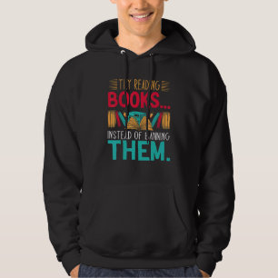 try reading books instead of banning them Groovy B Hoodie