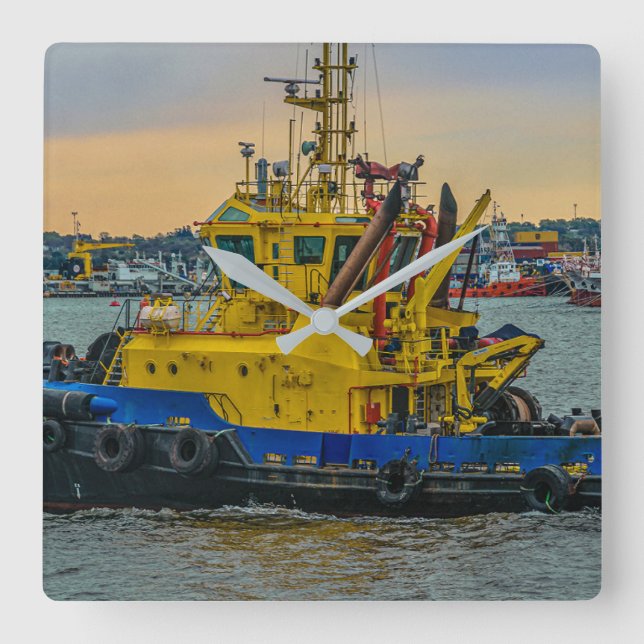 Tugboat sailing at river, montevideo, uruguay square wall clock (Front)