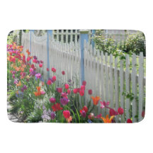 Tulips along white picket fence bath mat