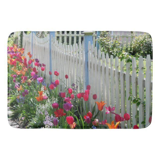Tulips along white picket fence bath mat (Front)
