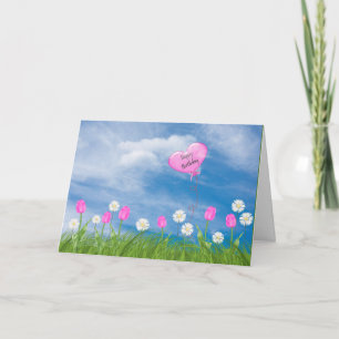 tulips and daisies in grass birthday card