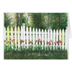 Tulips by the white fence