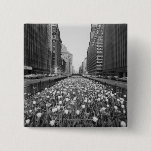 Tulips in middle of city street 15 cm square badge