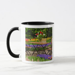 Tulips of table in garden, Keukenhof Gardens, Mug