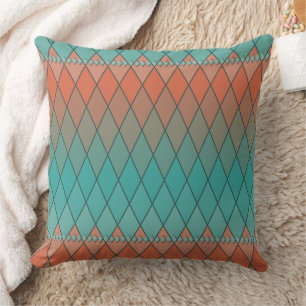 Turquoise and orange diamond pattern cushion