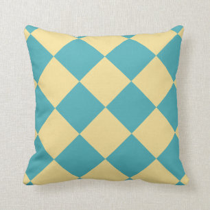 Turquoise and yellow diamond pattern cushion