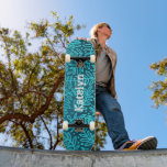 Turquoise blue leaf pattern custom name cool bold skateboard<br><div class="desc">Spread some flair on your city streets with this personalised, custom name skateboard. Modern, trendy, white distressed, edgy typography overlays a turquoise blue ombre leaf foliage damask pattern on a rich, deep teal textured background. Makes a cool and stylish statement every time you surf the pavement. A great gift for...</div>