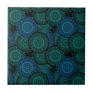 Turquoise blue round mandala on black background ceramic tile