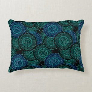 Turquoise blue round mandala on black background decorative cushion