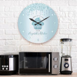 Turquoise Glitter Drips Cupcake Bakery Pastry Chef Large Clock<br><div class="desc">Make a stylish impression with this elegant, sophisticated, simple, and modern custom name wall clock. A sparkly, turquoise blue cupcake, handwritten script and glitter drips overlay a faux metallic turquoise aqua blue ombre background. Personalise with your full name, business, or other info. Your choice of a round or square clock...</div>