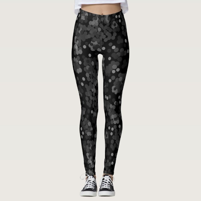 Turquoise green polka dot pattern on black leggings (Front)