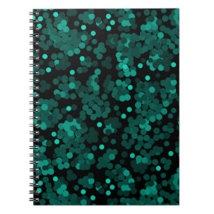 Turquoise green polka dot pattern on black notebook