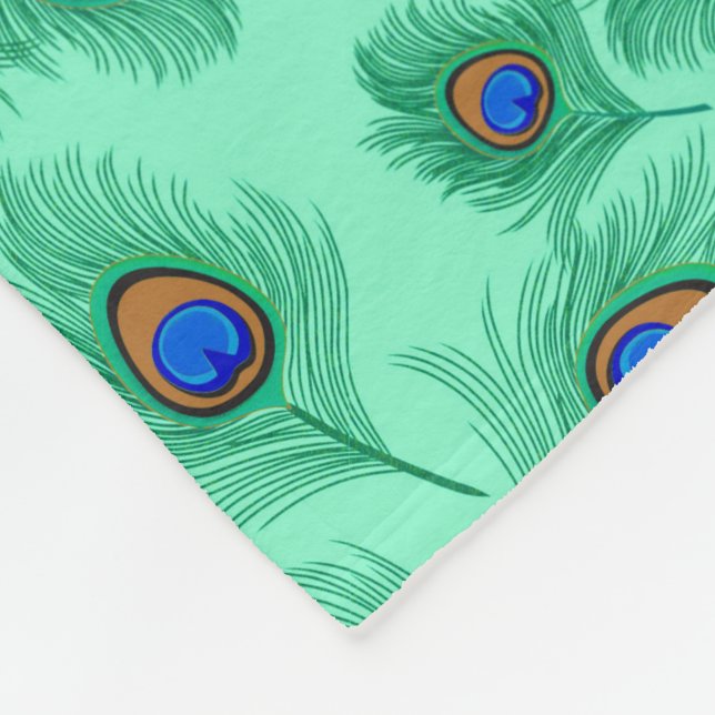 Turquoise Peacock Feathers on Light Aqua Fleece Blanket (Corner)