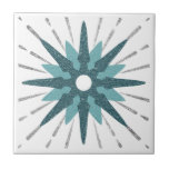 Turquoise & Silver Starburst Ceramic Tile<br><div class="desc">Modern tile with a large bold retro turquoise starburst serving as the focal point, complimented by modern silver starburst design elements. Modern bold celestial design in a turquoise and white colour palette. One design of a coordinating collection. Designed as a template, create your own custom design by using the fields...</div>