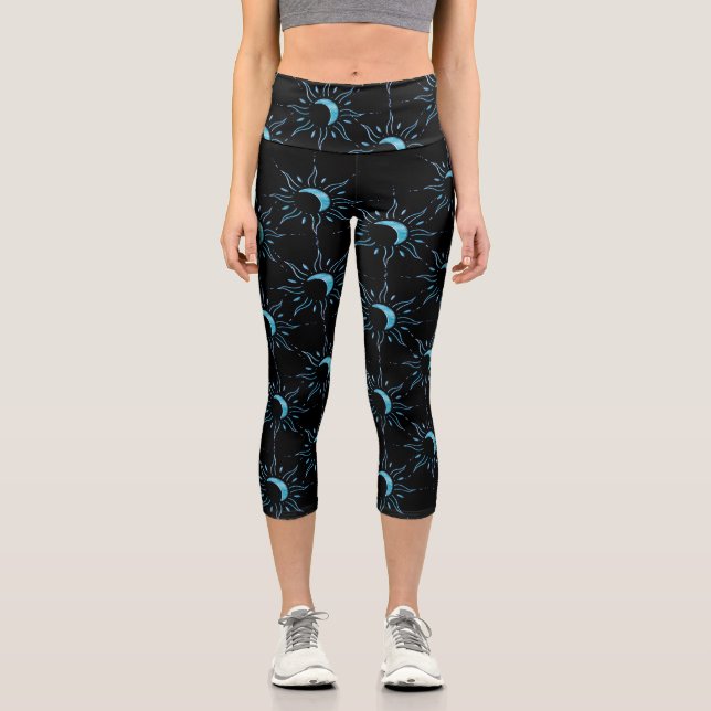 Turquoise Sun Scattered Black Background Capri Leggings (Front)